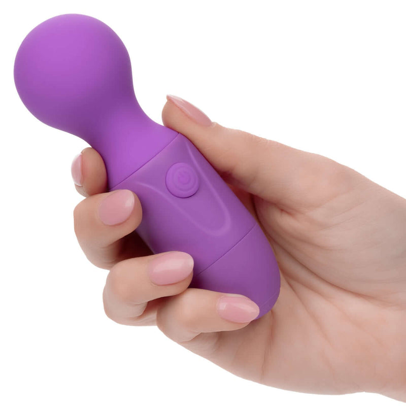 First Time Rechargeable Massager in Purple held in hand