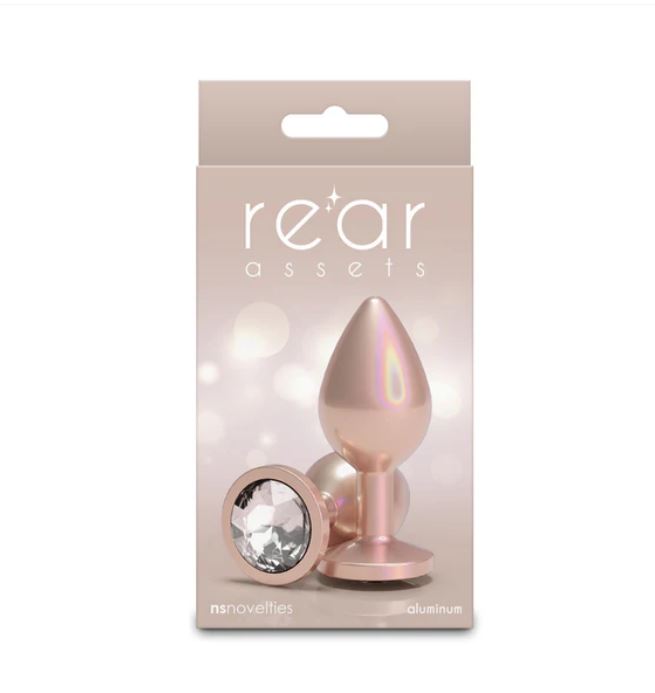 Rear Assets Chrome Anal Plug Medium Tan in elegant packaging with a glossy finish and diamond accent.