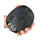Hand holding The M For Men Dome X automatic male masturbator by Blush with sleek design and easy-squeeze grip for intensified pleasure.