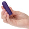 Hand holding Turbo Buzz™ Rounded Mini Bullet - Purple, a discreet and powerful 10-function vibrator.