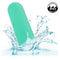 Green Turbo Buzz Mini Bullet Vibrator splashing in water, showcasing waterproof IPX7 rating. Compact, powerful 10-function stimulator.