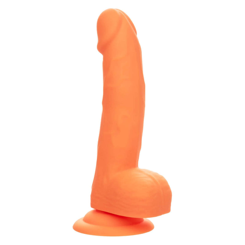 Vibrant orange 6-inch realistic silicone dildo with suction base for pleasurable experiences.