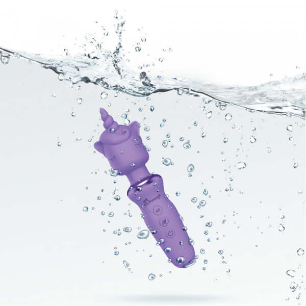 Viben Dreamii Wand Powerful Unicorn Lillac Wand floating in water, showcasing its enchanting design and features.
