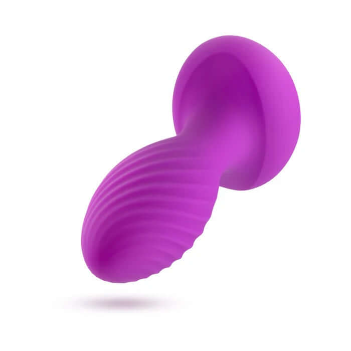 Vibrating anal plug with ribbed texture and sapphire gem base - Oh My Gem Mystery Plug Sapphire in vibrant purple.