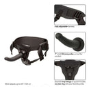 Black harness strap-on with 7" silicone probe featuring adjustable support straps for secure fit and comfort in role-play.