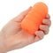 Pop Sock!™ Ribbed Orange reversible masturbator held in hand, showcasing its textured design for varied solo pleasures.