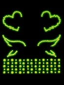Leg Avenue Ayla Adhesive Glow in the Dark Face Jewels with heart shapes and rhinestones illuminated in green.