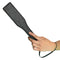 Nocturnal™ Collection Paddle with ergonomic design and double-stitched construction held by hand