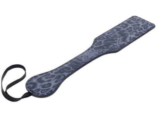 Blue leopard-print faux leather paddle with gold studs for stylish impact play.