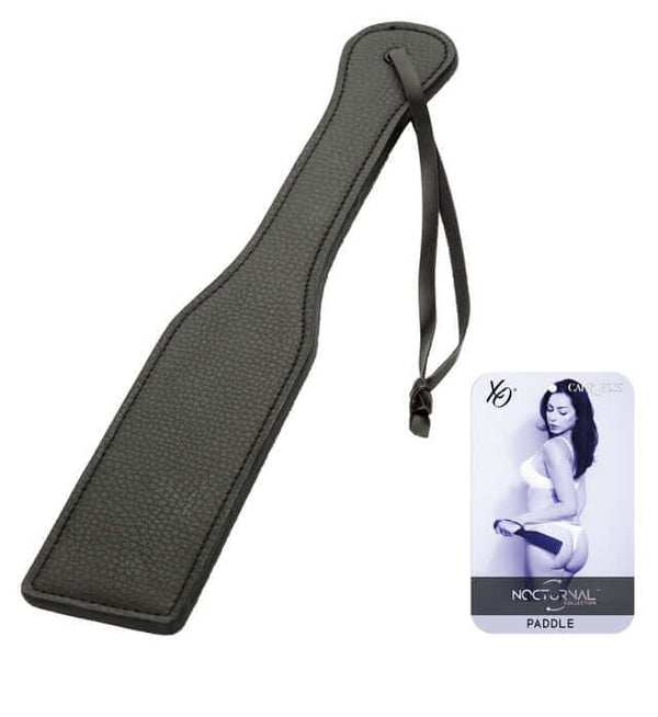 Nocturnal™ Collection Paddle with ergonomic design, featuring sensory impact play and a black double-stitched construction.