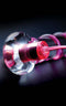 Close-up of Icicles No. 4 10-Function Glass G-Spot Vibrating Wand with pink ribbon detail for enhanced pleasure and upscale design.