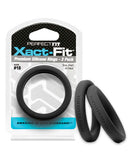 Perfect Fit Xact Fit No 18 Black Cock Rings 2 Pack in packaging with rings displayed.