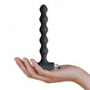 Petite Sensations Pearls Vibrating Anal Beads Black held in a hand, showcasing its slim design and powerful vibration settings.