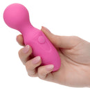 Hand holding pink First Time® Rechargeable Massager with flexible neck and power button