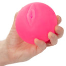 Holding Pop Sock!™ Pussy/Ass Pink Dual-Entry Masturbator in hand showing pussy opening