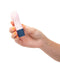 Hand holding Poppi Magnetic Mini Vibe, compact and discreet with 10 vibration functions, featuring a pink silicone finish and blue base.