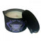 Blue Lotus Ignite pheromone massage candle in black container with open lid, 6oz, enhances intimate moments.