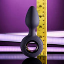 Evolved My Precious vibrating plug with ringed handle and tapered tip, measuring over 4 inches tall against a purple backdrop with a measuring ruler.