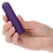 Hand holding Turbo Buzz™ Rounded Bullet purple compact 10-function vibrator for discreet and powerful on-the-go pleasure