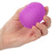 Hand holding Pop Sock!™ Textured Purple Stroker with dual-texture design and stretchy material for versatile, thrilling experiences
