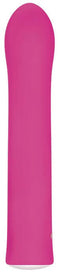 Rechargeable pink G-Spot vibrator with seven speeds and curved tip for targeted stimulation and discreet pleasure in nightstand.