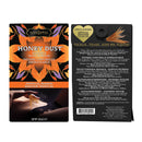 Kama Sutra Honey Dust Tropical Mango Body Powder 1 Oz packaging featuring kissable body powder and feather tickler.