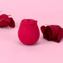 Alchemy Rosebud Luxury Air-Pulse Massager Red with rose design on pink background.