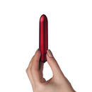 Truly Yours Scarlet Velvet 10 Speed Bullet Vibrator held in hand, showcasing its sleek red design.