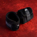 Sei Mio Sensually Secured Restraints - comfortable padded wrist restraints on a red background.