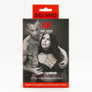 SEI MIO Twin Tweaks Velvet Collar with Nipple Clamps packaging displayed with couple showcasing its use.