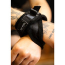 Image of SEI MIO Cross Purposes Unique Over-Wrap Cross Cuff Restraints on a wrist, showcasing their elegant design.