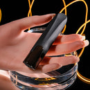 Selopa Little Buddy Vibrating Bullet held in hand with sleek design and chrome-finished base