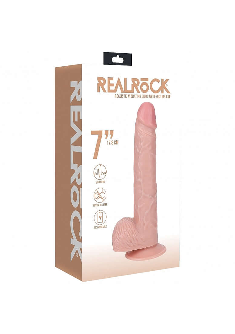 RealRock Vibrating Cock with Balls 7 inch Vanilla packaging featuring realistic design and suction cup base.