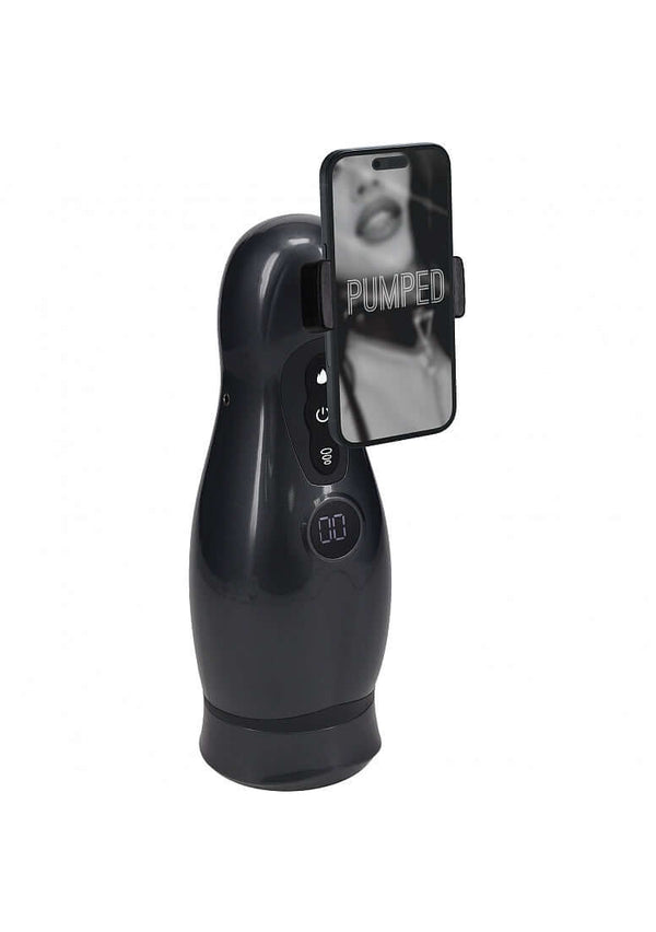 Pumped Virtuo 10 Function Masturbator with Phone Attachment featuring phone holder and control buttons.