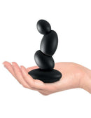 Sir Richards Control Dual Motor P Spot Massager held in a hand, showcasing its ergonomic design and compact size.