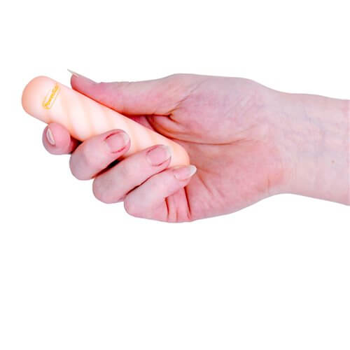 Softies Dual Layer Vibrating Bullet 4 inches Orange held in a hand, showcasing its silky smooth design.