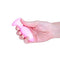 Softies Dual Layer Butt Plug 4 inches Pink being held in a hand, showcasing its ergonomic design.