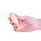 Softies Dual Layer Butt Plug 4 inches Orange held in a hand, showcasing its compact and silky design.
