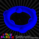 Oxballs Spinner Single Silicone Cock Ring Glacier in blue liquid silicone against a dark background.
