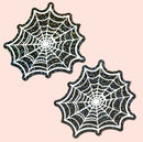 Glitter Black Glow in the Dark Spooky Spider Web Nipple Covers designed for Halloween costumes or themed parties.