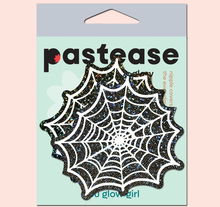 Glitter Black Glow in the Dark Spooky Spider Web Nipple Covers packaging by Pastease for Halloween costumes.