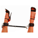 Master Series Black Steel Adjustable Spreader Bar with secure restraints holding ankles apart