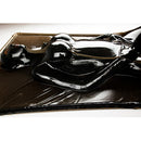 Kink Industries Extreme Black Latex Vacuum Bed with a figure enclosed in sleek black latex for total-body immobilization.