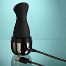 Playboy The Jet Set Sucker clitoral suction toy in sleek metallic black self-charging travel case with USB cable.