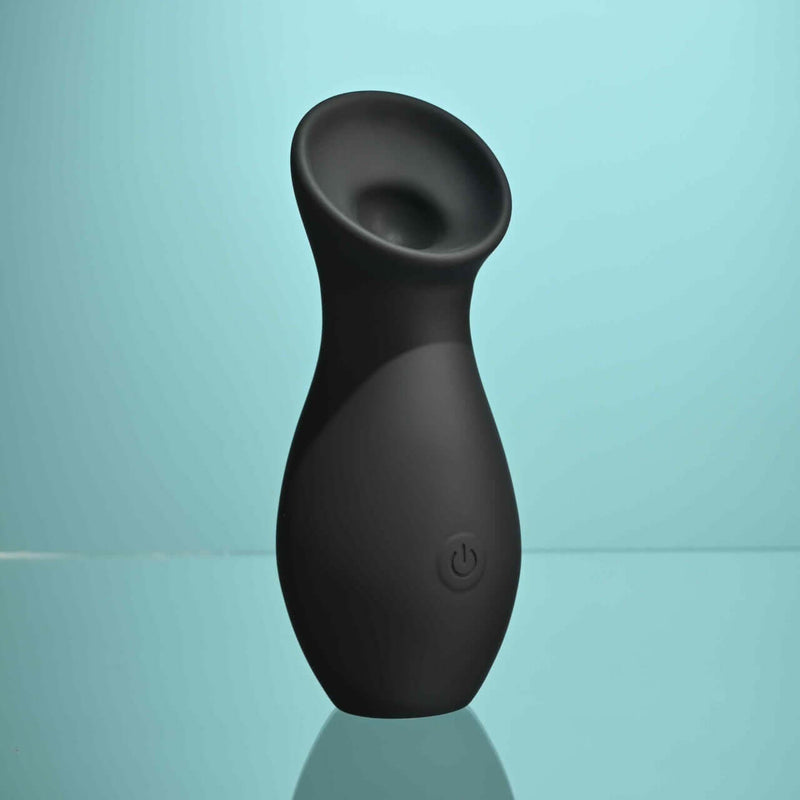 Playboy The Jet Set Sucker clitoral suction toy in sleek black with flexible tip and power button.