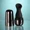 Playboy The Jet Set Sucker clitoral suction toy with sleek metallic black self-charging case for on-the-go pleasure.