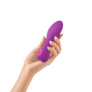 Femme Funn Solia Bullet Flat Tipped Vibrator Purple being held, showcasing its unique design for enhanced sensation.