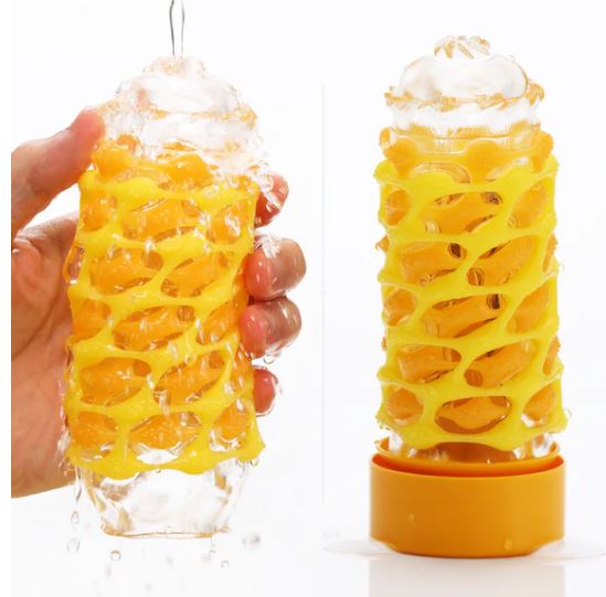 Tenga Arte Weave Stroker with textured design, showcasing yellow elastomer and water stream for enhanced stimulation.