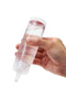 Hand holding bottle of thick, water-based lubricant for use with Tenga masturbators.