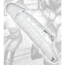 Tom of Finland Clear Realistic Cock Enhancer displayed against a stylized erotic background.